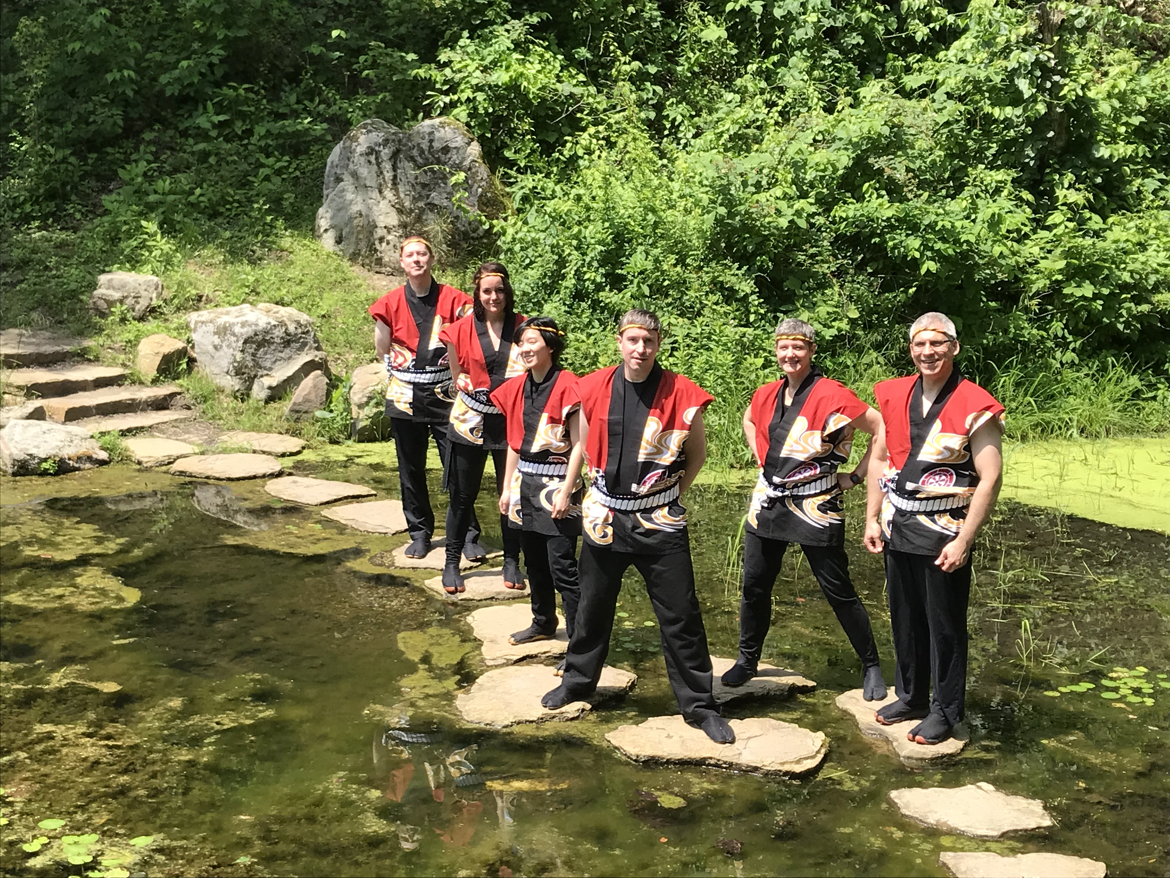 Pittsburgh Taiko players at the Pittsburgh Botanic Garden lotus pond in 2018